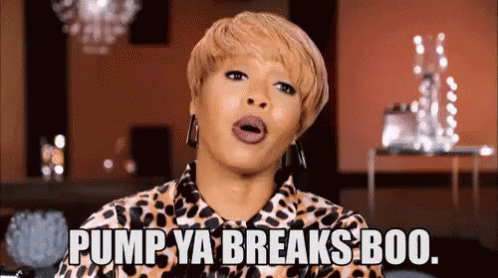 The image shows a woman speaking with an assertive expression, wearing a leopard-print top. The caption reads, "Pump ya breaks boo," implying that someone needs to slow down or reconsider their actions. The tone is sassy and confident.