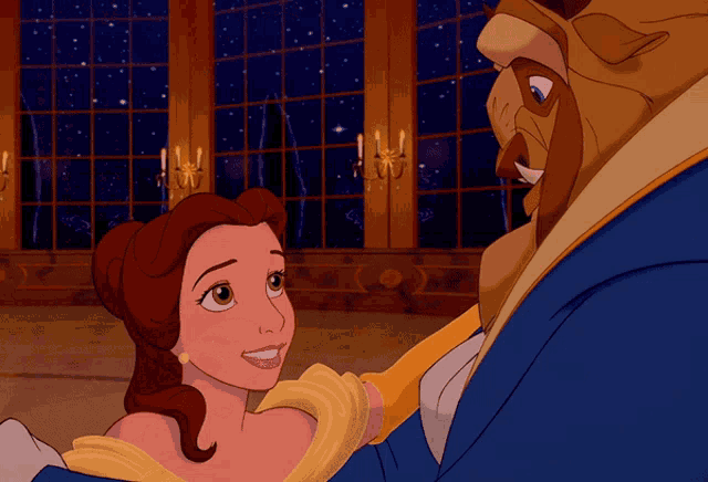 The image is from Disney's Beauty and the Beast, showing Belle and the Beast dancing in the grand ballroom. Belle, in her iconic yellow dress, gazes up lovingly at the Beast, who is wearing a royal blue suit. The background features tall windows with a starlit sky, creating a magical and romantic atmosphere as the two characters share a tender moment during their dance.
